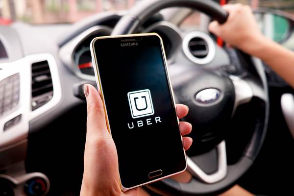 Who pays when an Uber causes an accident?